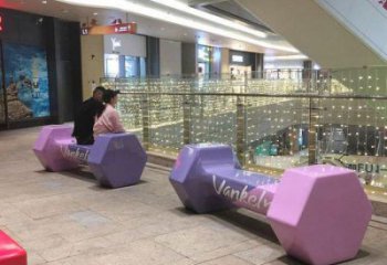 坐凳雕塑，休憩景觀小品，啞鈴坐凳雕塑廠家
